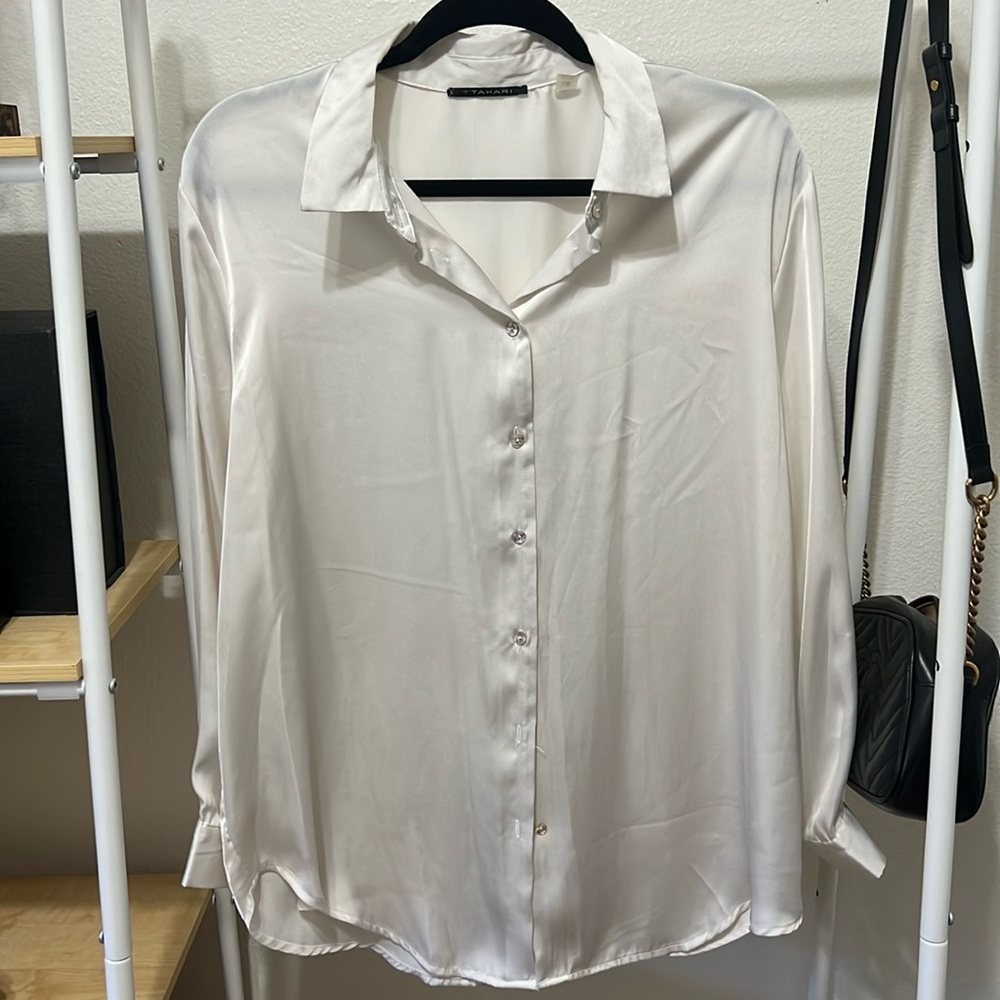 Ivory button up blouse. True to size 100% polyester